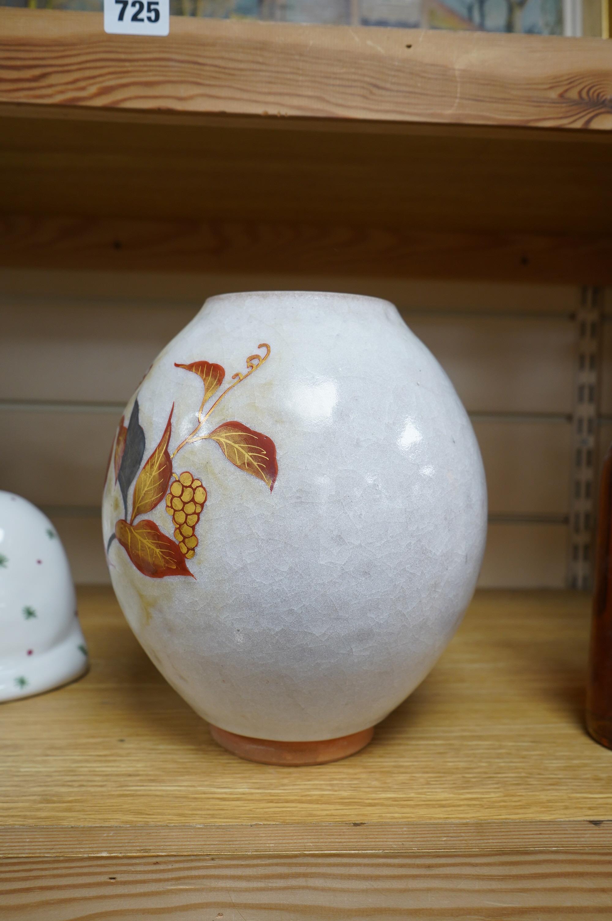 A Chinese terracotta and enamel vase with gilded leaf decoration, seal mark to the base, 23cm high. Condition - good